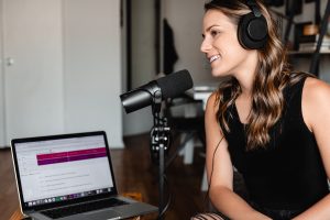 woman with microphone and headphones