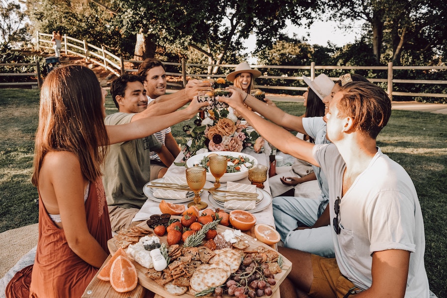 table with food and people
